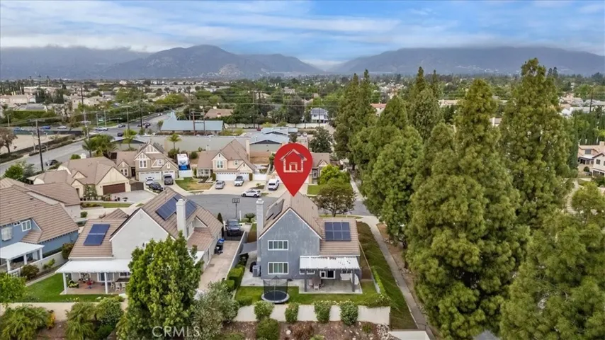 Arial view North facing with red diamond over the home