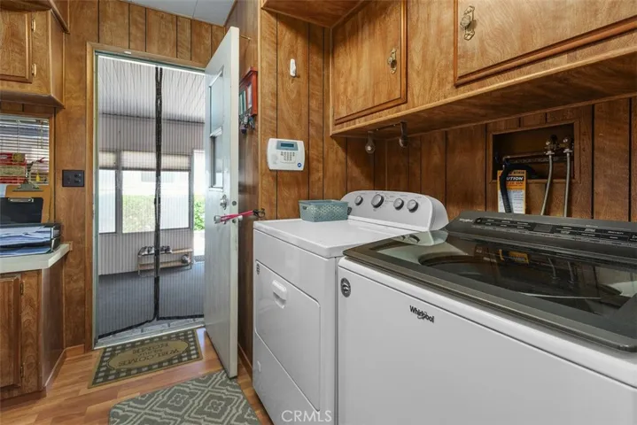 Laundry room leads to sunroom which leads to garage