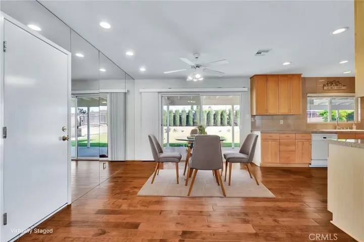 Dining room and kitchen with direct access to large yard.
Virtually staged.