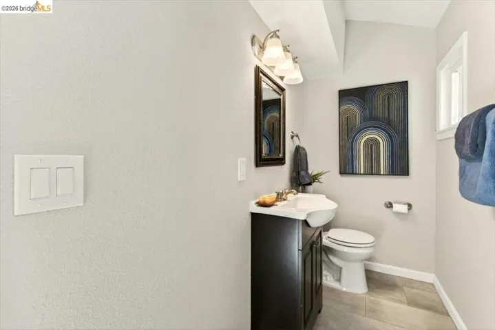Bathroom with vanity and light tile patterned floors