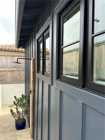 Outdoor shower off of front courtyard