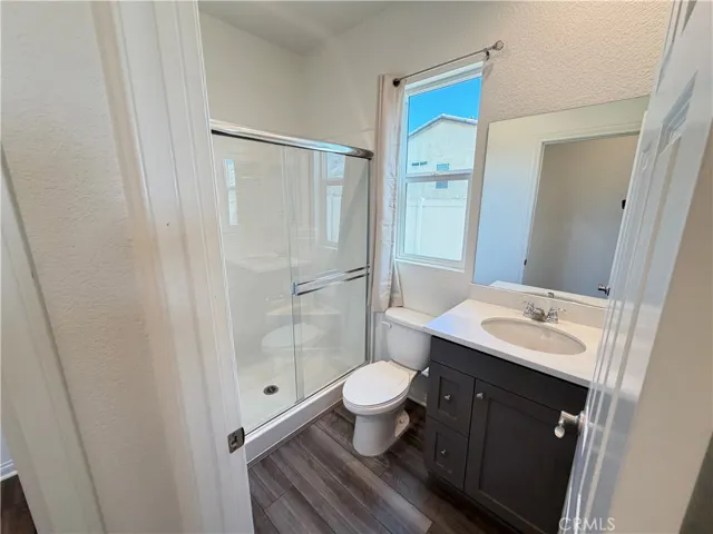 Main Level bedroom with private bathroom/ walk-in closet