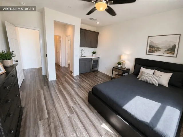 Virtually staged main level bedroom