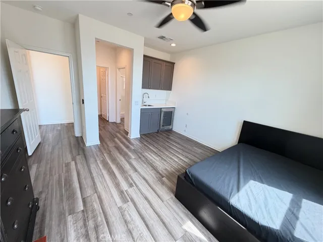 Main-level bedroom with kitchenette.