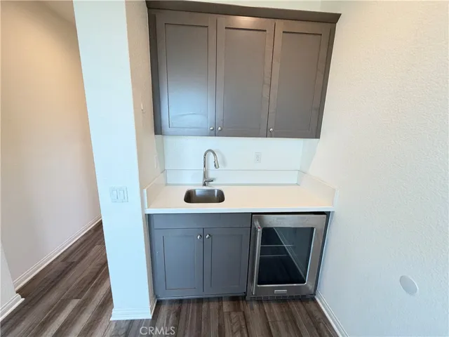 Main-level bedroom with kitchenette.