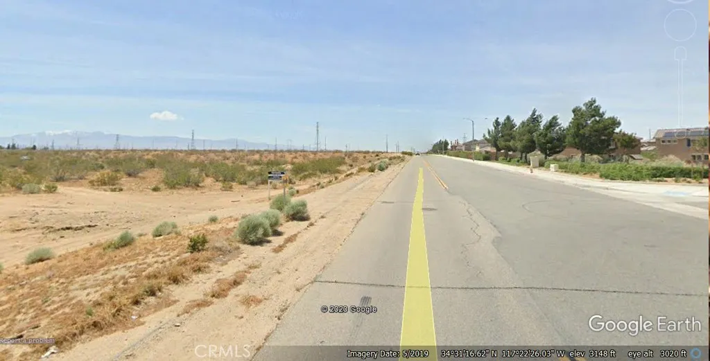 LOOKING WEST IN FRONT OF THE PROPERTY