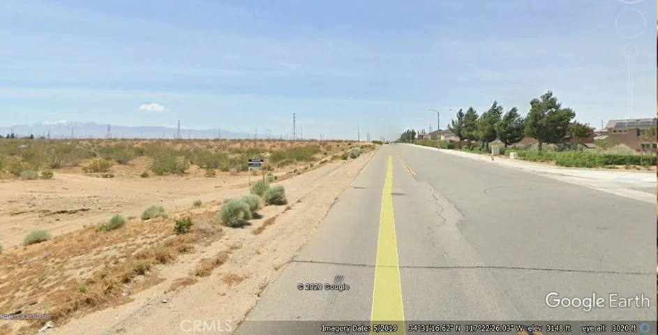LOOKING WEST IN FRONT OF THE PROPERTY