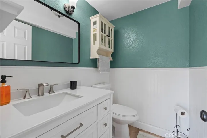 Downstairs powder room has been remodeled