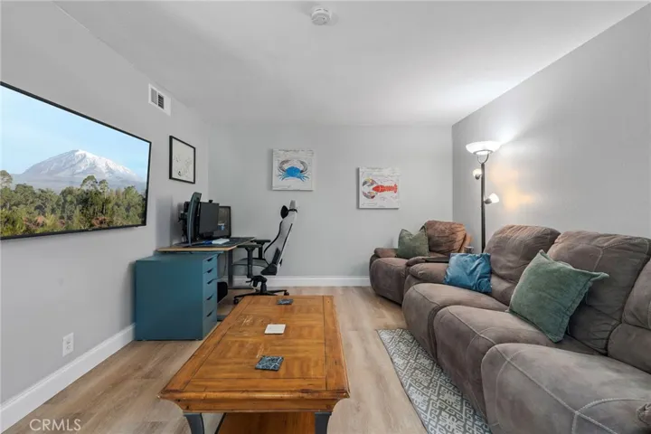 Living room with luxury vinyl flooring.