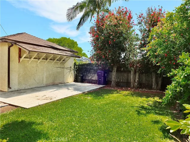 Spacious backyard awaits your patio decor