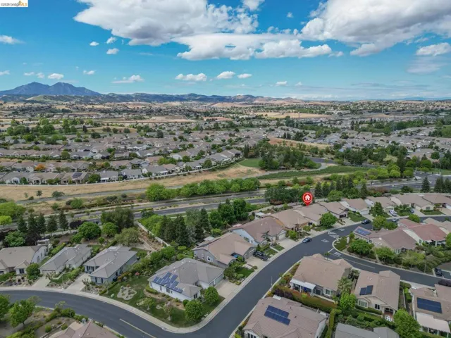 Aerial perspective of suburban area featuring mountains