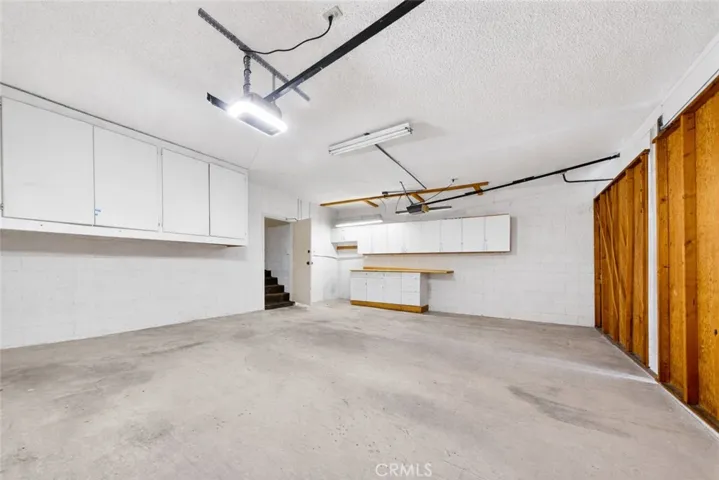 The 3-car-garage has been cleaned up with AI