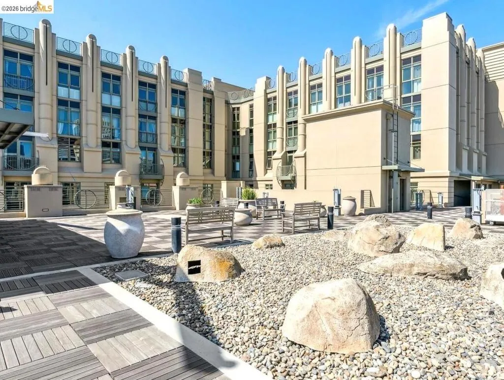 View of property's community featuring a patio