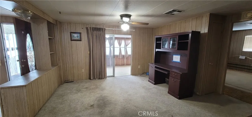 Possibility to expand master bedroom closet where this desk sits on a remodel.