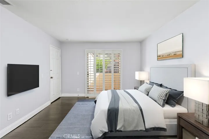 Spacious primary room with private balcony.
*Photo is virtually staged
