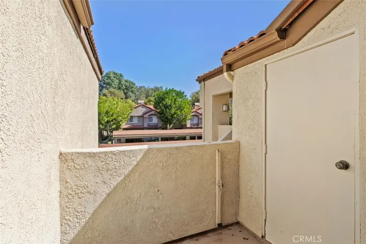 Private balcony with storage closet.