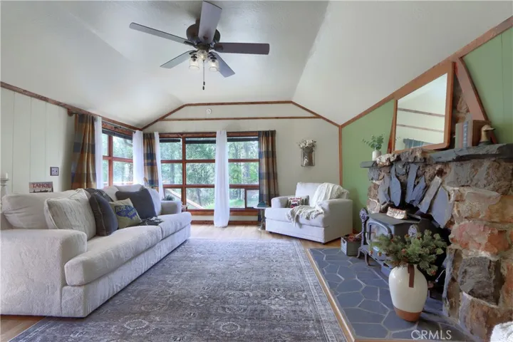 Check out the Gorgeous Wood Framed Windows & Granite Style Fireplace!