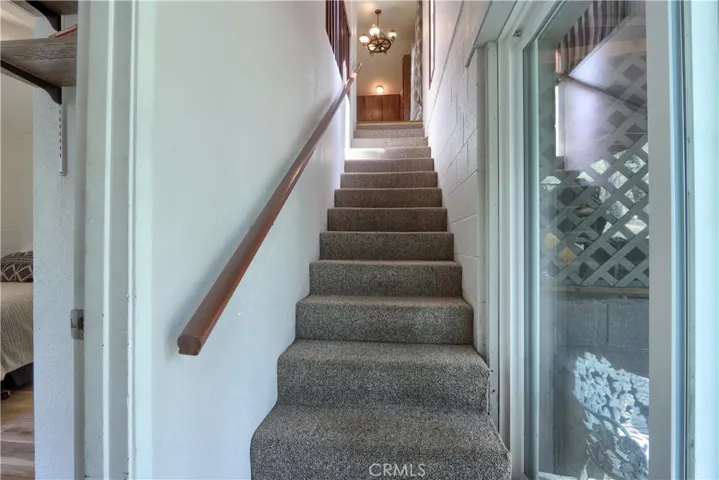 Downstairs Primary w/walkout patio