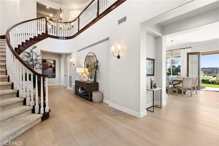 Striking two-story foyer entrance