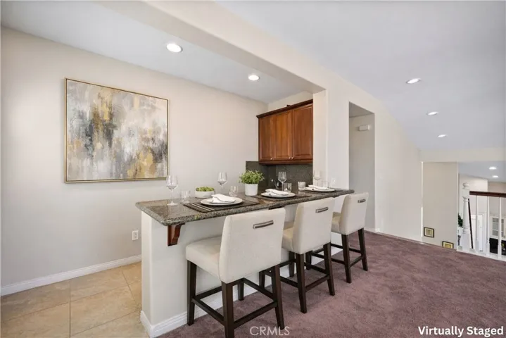 Wet Bar in Loft - Disclaimer: Some elements have been virtually staged