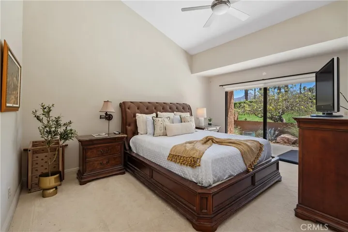 Primary bedroom with sliders which lead to back patio.