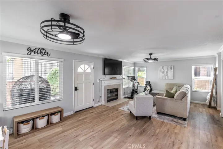 Great open floor plan with NEW high-end wood laminate flooring throughout. Handsome ceiling fan.