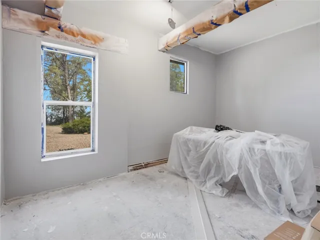 2 of 3 unfinished rooms