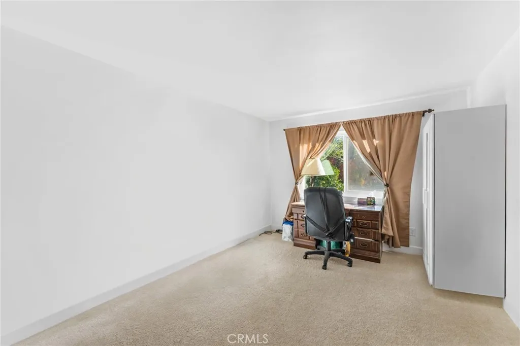 Bedroom 5 with closet. Currently used as an office