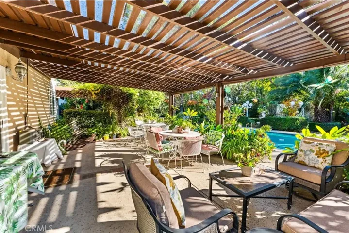 Patio is large & overlooks sparkling pool