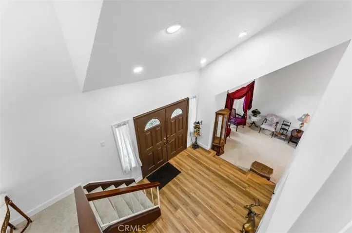 Cathedral ceilings welcome you in this large foyer