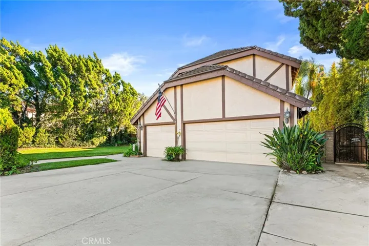 Love the extra long driveway & even side area offering plenty of parking
