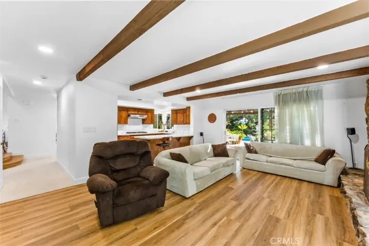 Family room lookin towards open, bright kitchen