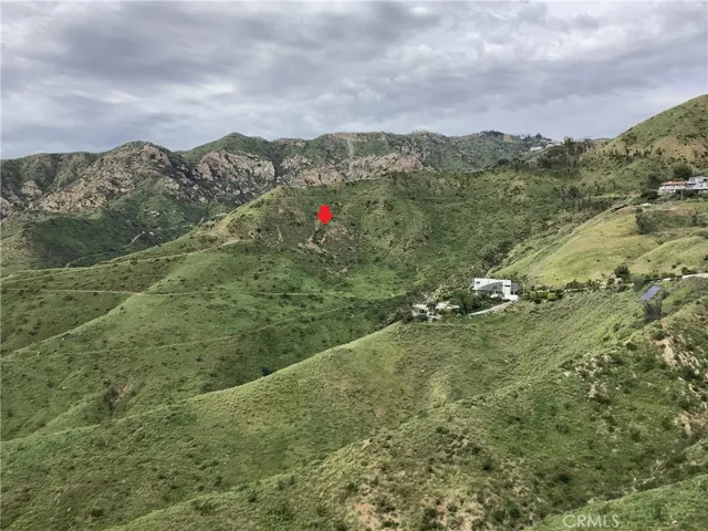 Arrow indicates land location