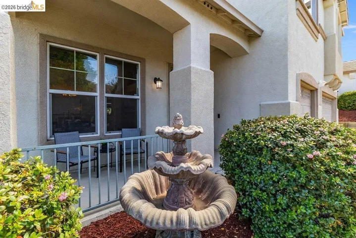 Doorway to property with stucco siding