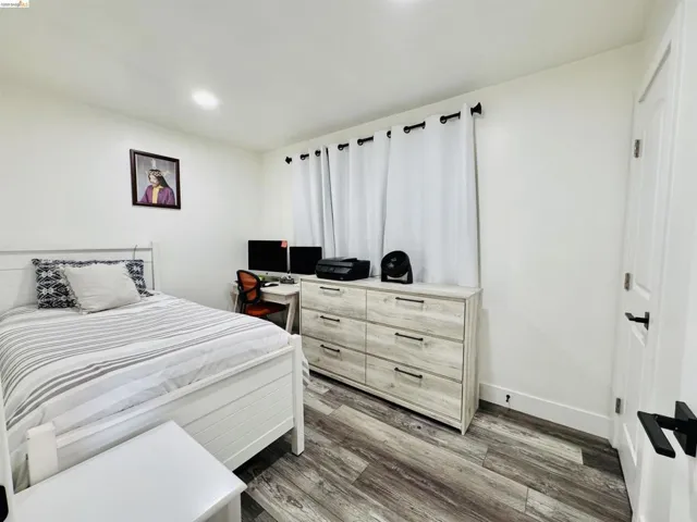 Bedroom featuring light wood-style floors and recessed lighting