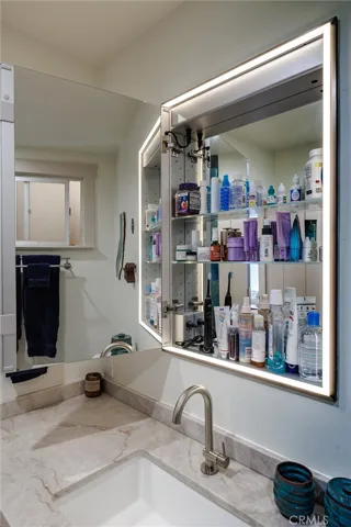 Mideli lighted mirrors with multiple Kelvin settings, defogging feature and interior outlet to keep shavers or electric toothbrushes out of sight
