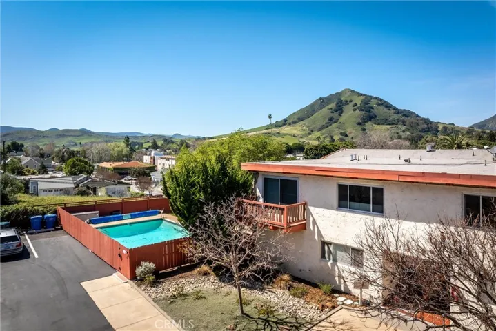 On a hilltop overlooking downtown, with treetop views of the city