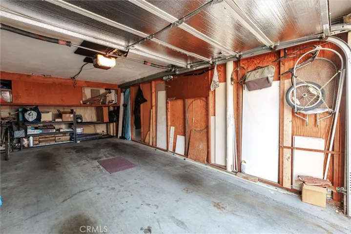 A dedicated one-car garage with storage plus up to one additional parking space