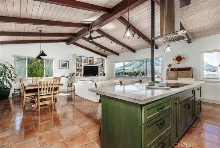 The kitchen is open to living and dining room areas