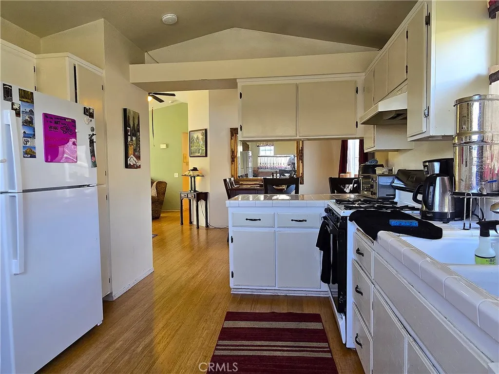 A streamlined galley design offers a chef-friendly workspace with intuitive flow, keeping everything within easy reach while maintaining a clean, modern aesthetic.