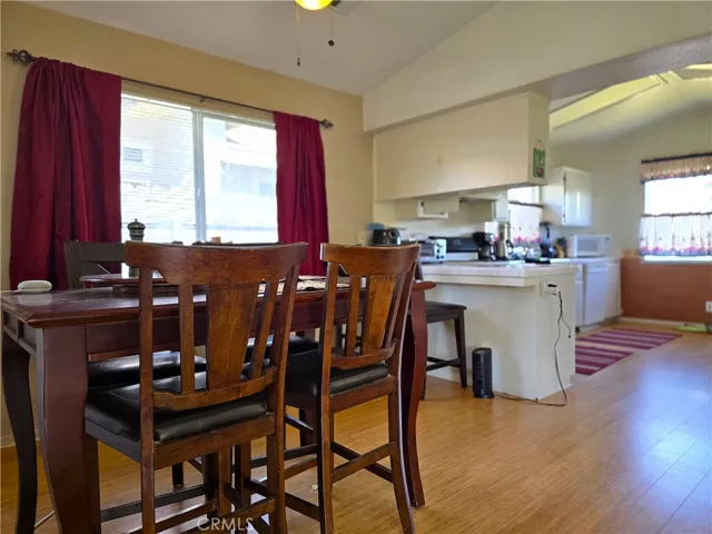 Soft morning light fills the kitchen, creating an inviting space for coffee, conversation, and a calm start to the day.