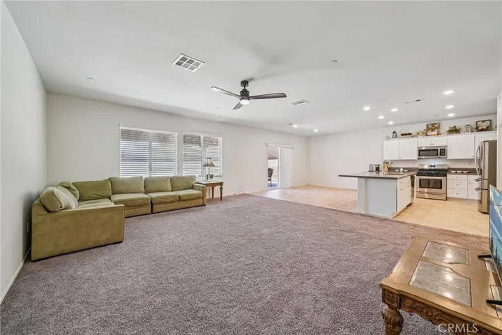 Living room, dining area, and kitchen open concept