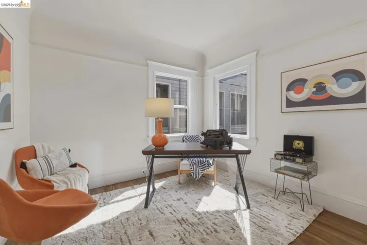 Office area featuring light wood finished floors and baseboards
