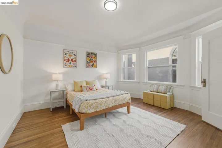 Bedroom featuring wood finished floors