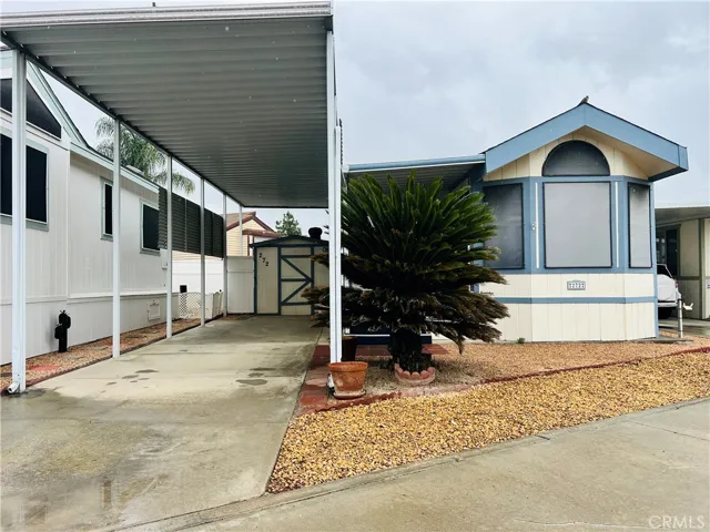 Front view with carport
