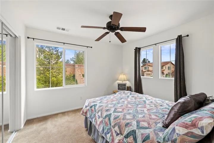 Upstairs Room #2--Upgraded Mirrored Wardrobe & Ceiling Fan