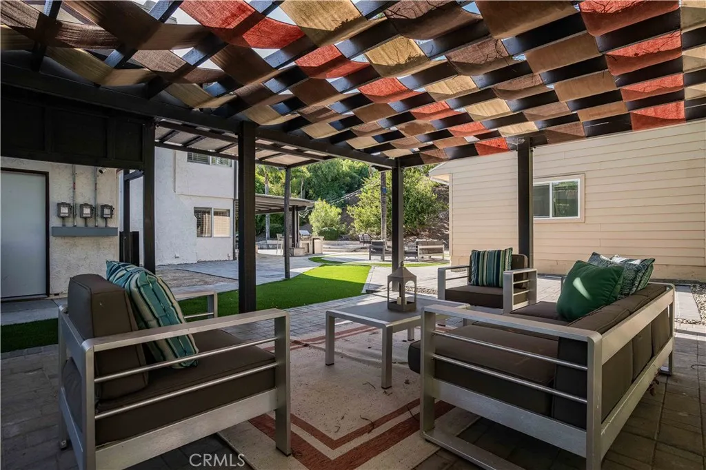 covered patio adjacent to detached studio