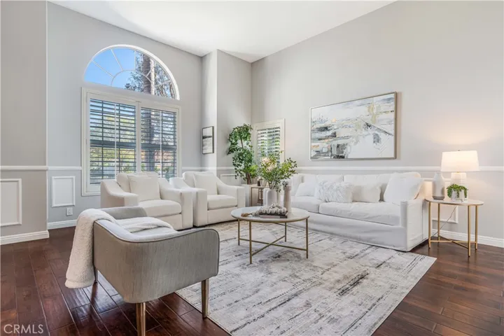 living room with soaring cathedral ceiling