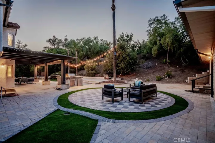 twilight view of backyard