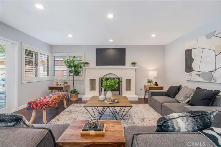 family room with newly remodeled Venetian plaster fireplace (second fireplace), gas starter